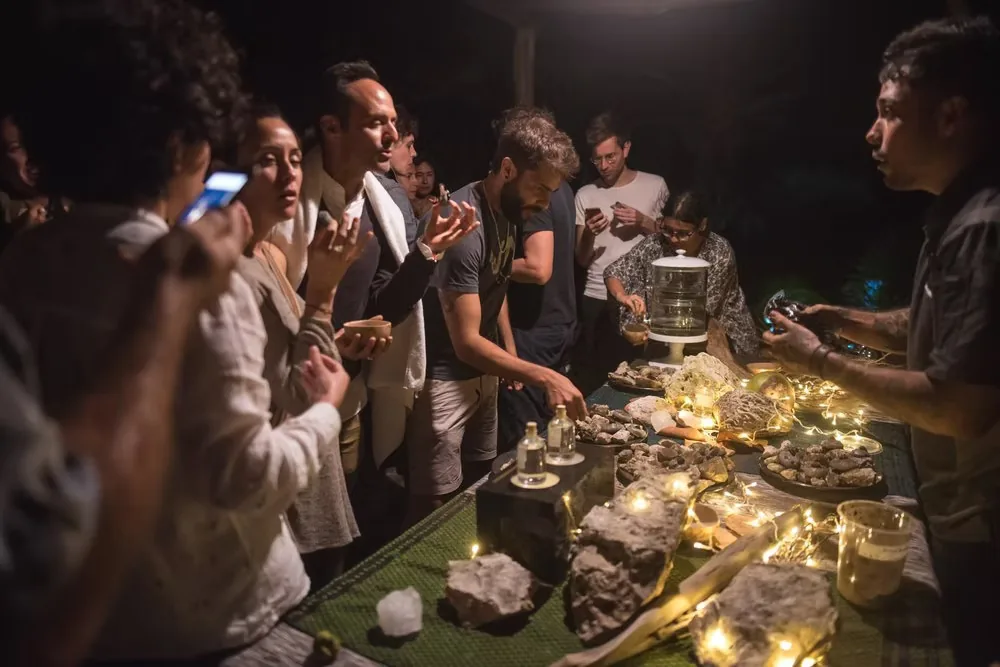Communal offering table at night, Aki Aora 2018