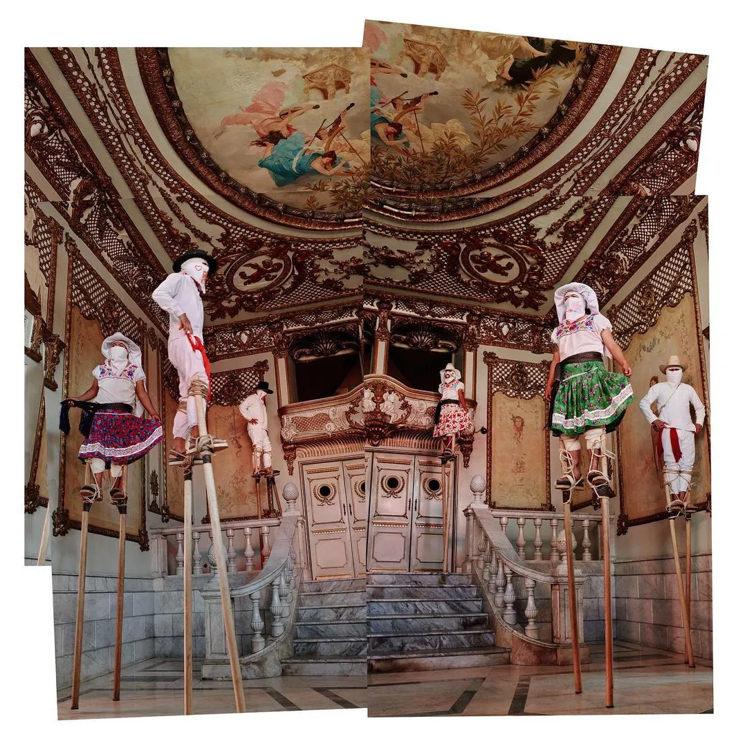 Stilt dancers in a baroque palace