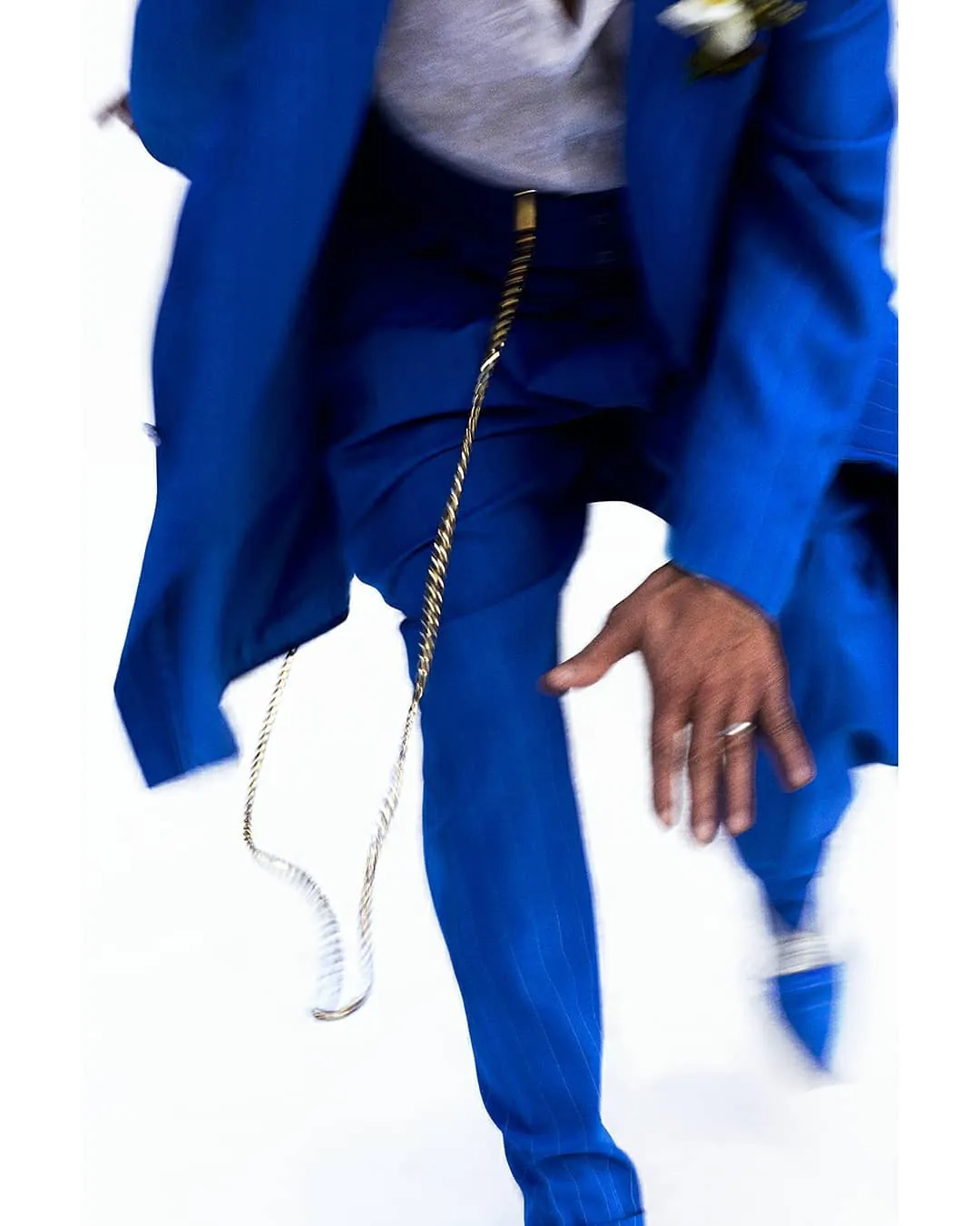 Blue suit with gold chain