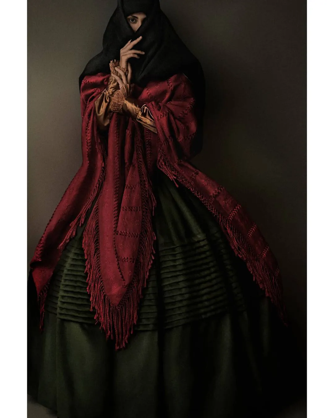 Red shawl and green skirt