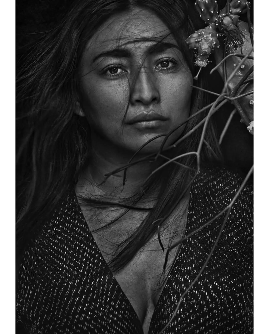 Portrait with cactus flowers